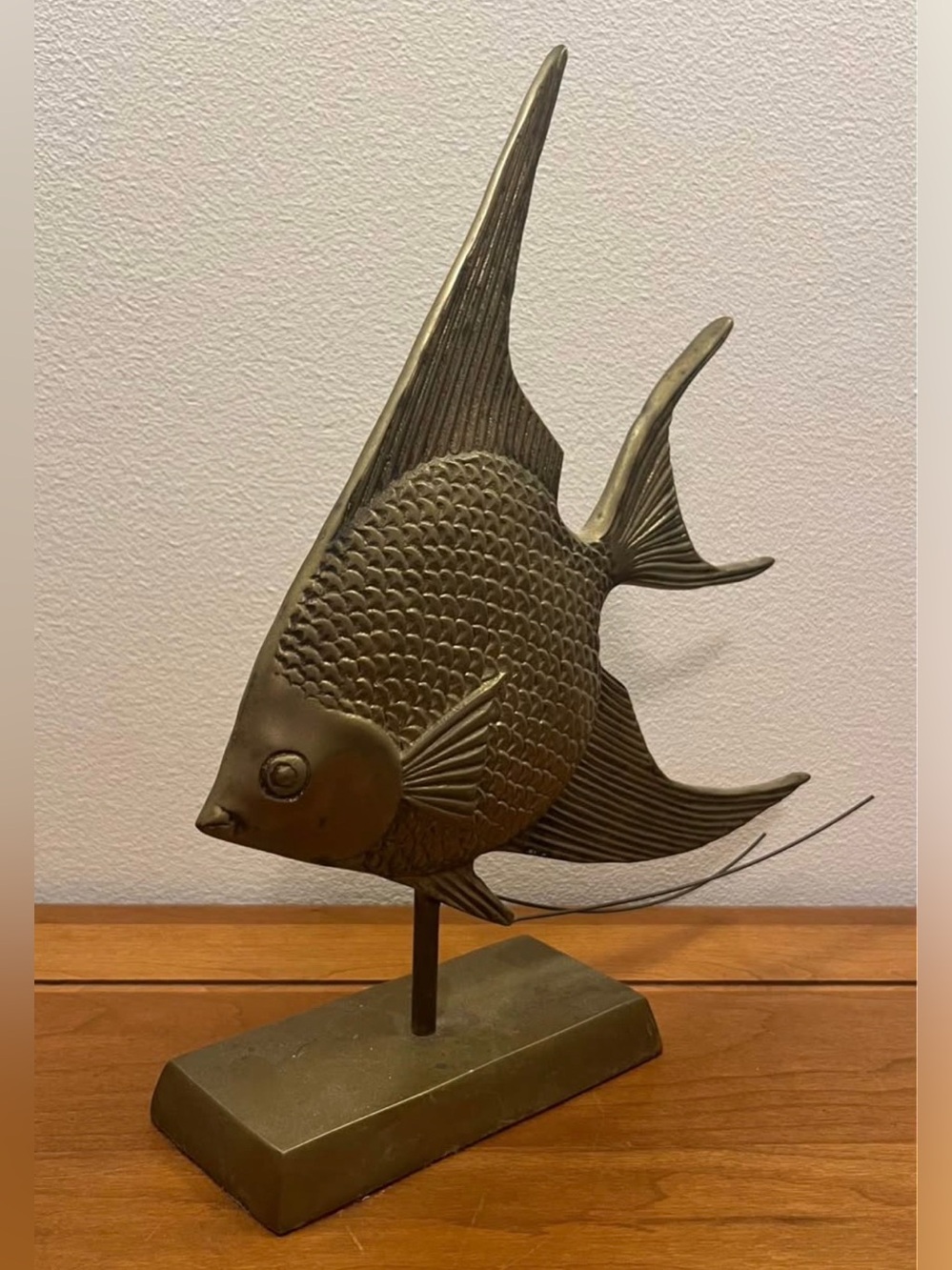 Vintage brass angelfish figurine sculpture on a stand